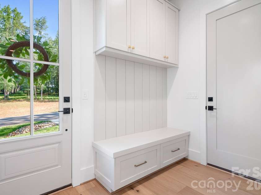 126 Manorly Lane, Mooresville, NC 28115.  MLS# CAR4391858, YatesRealty ID 34565. Side/Gagrage entry mudroom