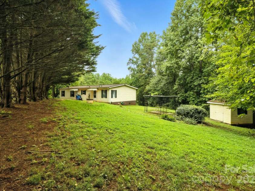 6337 Fairlane Street, Hickory, NC 28602.  MLS# CAR4287746, YatesRealty ID 34574. Back Yard / Shed