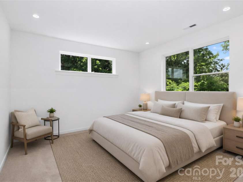 2716 Baltimore Avenue, Charlotte, NC 28203.  MLS# CAR4385672, YatesRealty ID 34576. 2nd floor bedroom suite virtually staged