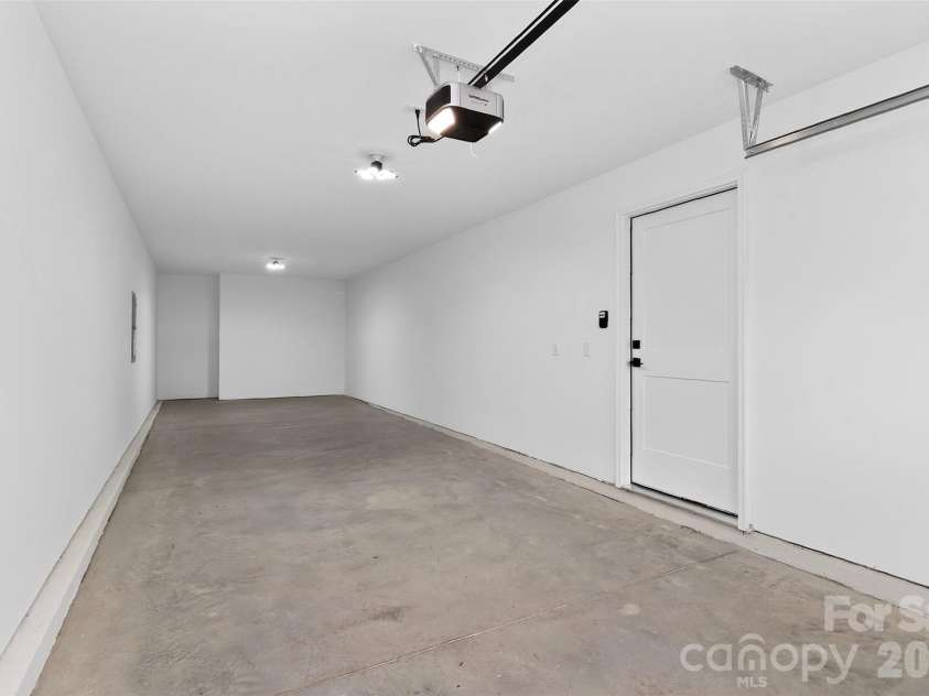 2716 Baltimore Avenue, Charlotte, NC 28203.  MLS# CAR4385672, YatesRealty ID 34576. 39' deep tandem garage