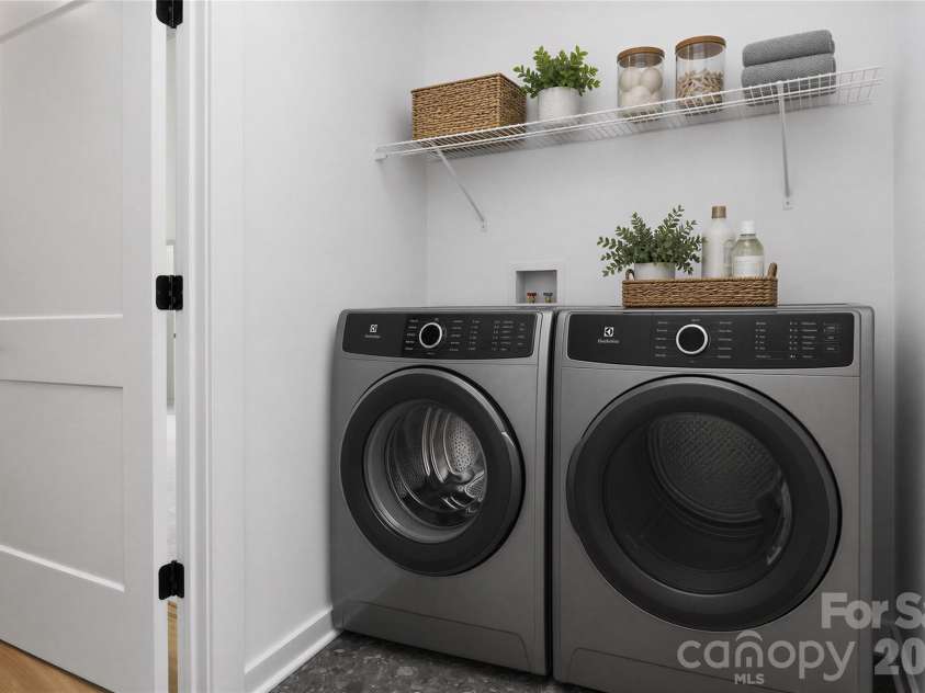 2716 Baltimore Avenue, Charlotte, NC 28203.  MLS# CAR4385672, YatesRealty ID 34576. 3rd floor side by side laundry virtually staged