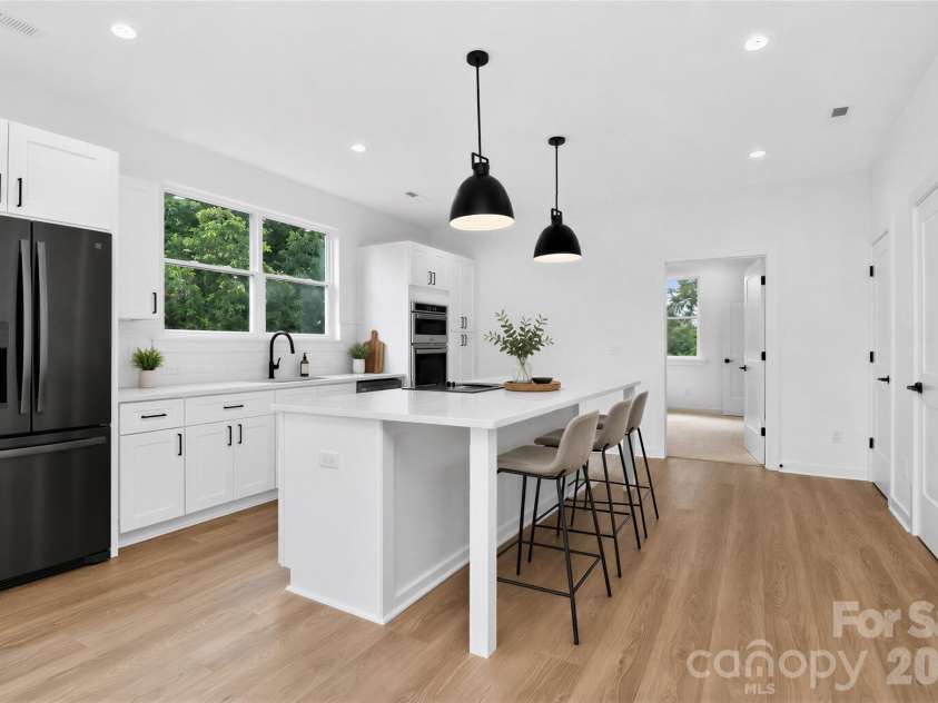 2716 Baltimore Avenue, Charlotte, NC 28203.  MLS# CAR4385672, YatesRealty ID 34576. Kitchen 2nd floor virtually staged