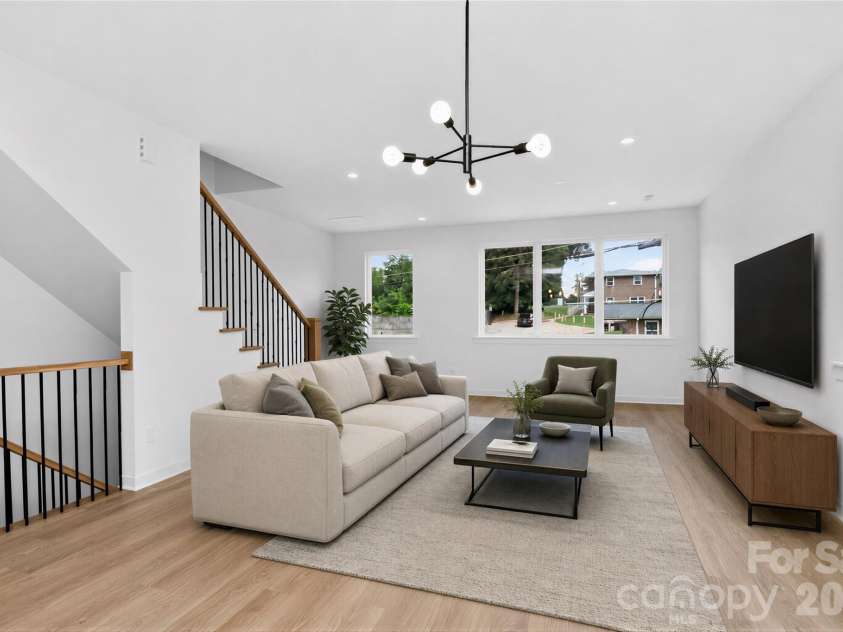 2716 Baltimore Avenue, Charlotte, NC 28203.  MLS# CAR4385672, YatesRealty ID 34576. Living area 2nd floor virtually staged