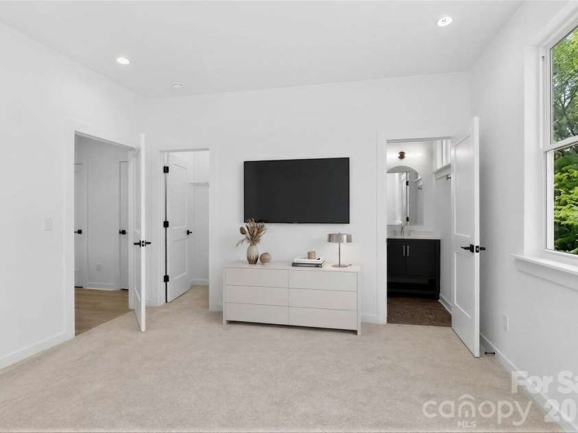 2714 Baltimore Avenue, Charlotte, NC 28203.  MLS# CAR4360205, YatesRealty ID 34577. 2nd floor bedroom suite virtually staged