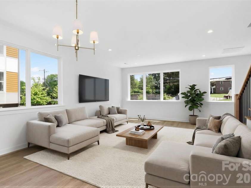 2714 Baltimore Avenue, Charlotte, NC 28203.  MLS# CAR4360205, YatesRealty ID 34577. 2nd floor living area virtually staged
