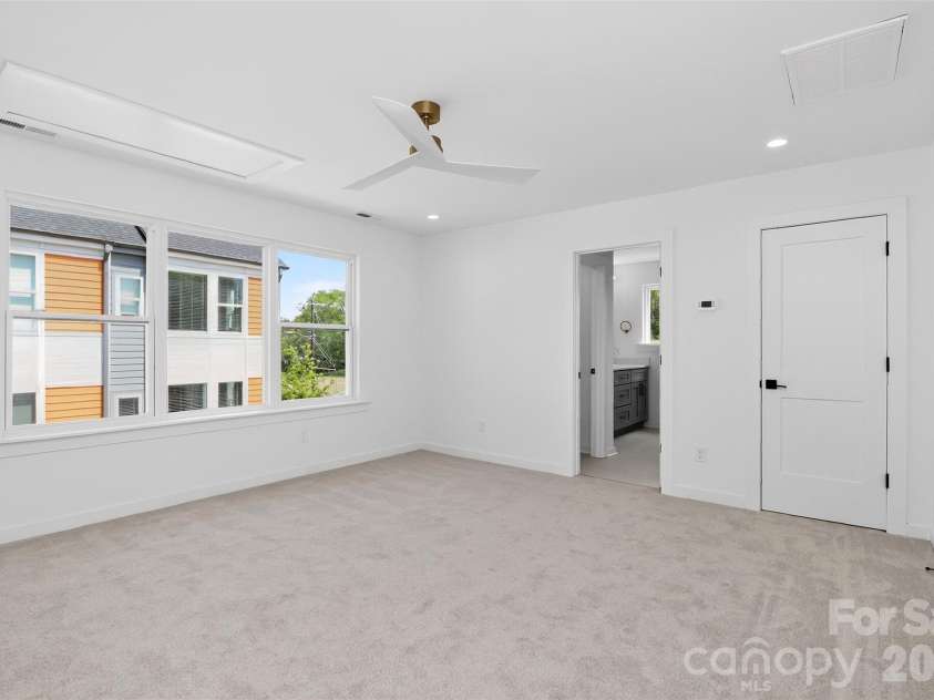 2714 Baltimore Avenue, Charlotte, NC 28203.  MLS# CAR4360205, YatesRealty ID 34577. 3rd floor primary suite