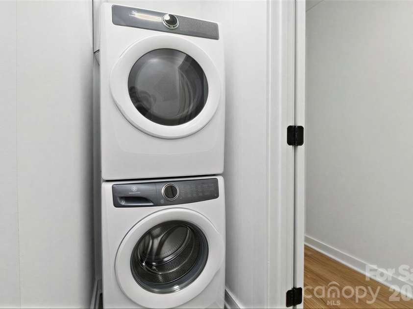 2714 Baltimore Avenue, Charlotte, NC 28203.  MLS# CAR4360205, YatesRealty ID 34577. Main floor stackable laundry virtually staged