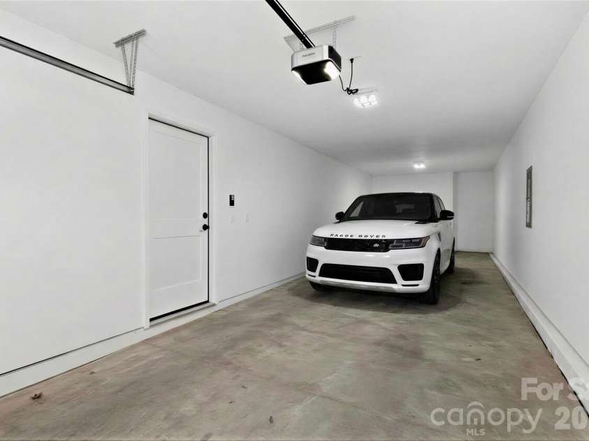 2714 Baltimore Avenue, Charlotte, NC 28203.  MLS# CAR4360205, YatesRealty ID 34577. Tandem garage with virtually added vehicle for effect