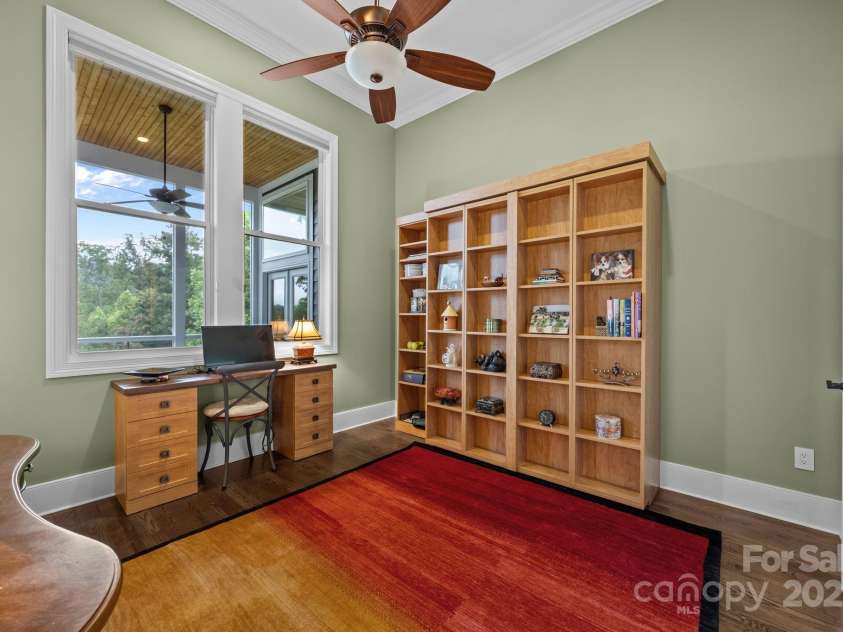 45 Penley Park Drive, Weaverville, NC 28787.  MLS# CAR4289463, YatesRealty ID 34577. Bedroom with built-in Murphy bed and desk