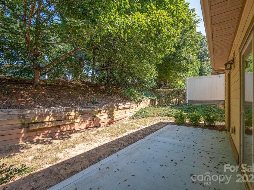 102 Coral Lane, Mooresville, NC 28117.  MLS# CAR4282698, YatesRealty ID 34585. New rear patio concrete