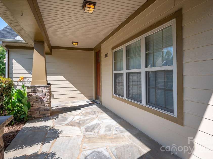 102 Coral Lane, Mooresville, NC 28117.  MLS# CAR4282698, YatesRealty ID 34585. Super wide patio!