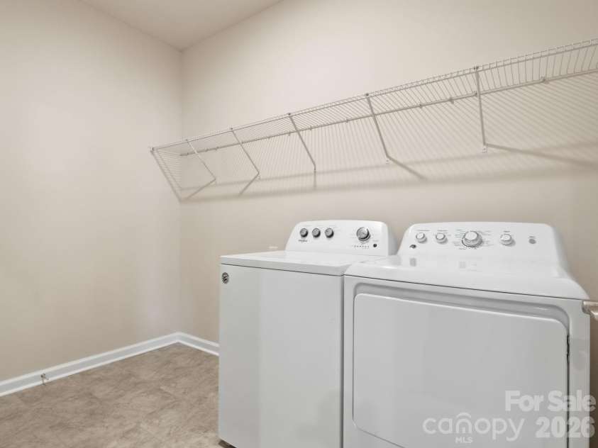 4047 Havenport Circle, Tega Cay, SC 29708.  MLS# CAR4394582, YatesRealty ID 34585. Laundry room off of the kitchen
