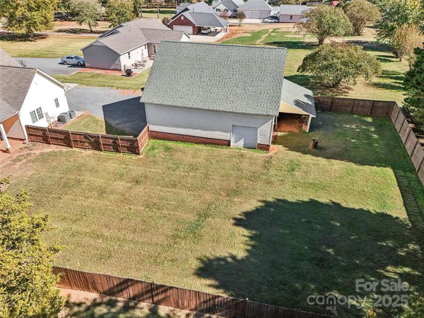 495 Gold Knob Road, Salisbury, NC 28146.  MLS# CAR4312214, YatesRealty ID 34586. Nice level back yard that is fenced with a privacy fence.