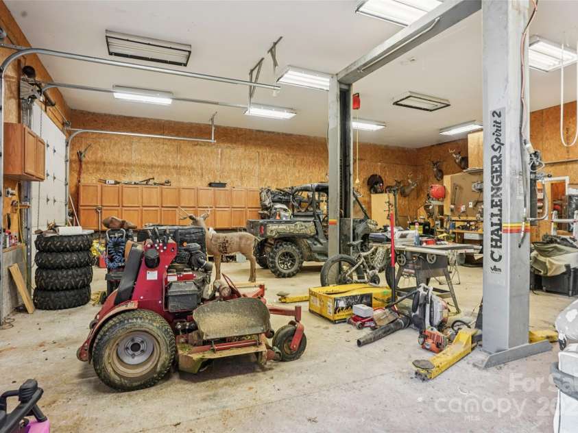 495 Gold Knob Road, Salisbury, NC 28146.  MLS# CAR4312214, YatesRealty ID 34586. Your HUGE detached garage with a lift and TONS of storage upstairs!
