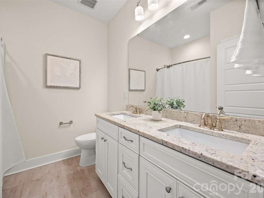 12021 Grey Partridge Drive, Charlotte, NC 28278.  MLS# CAR4396177, YatesRealty ID 34589. Secondary Bathroom