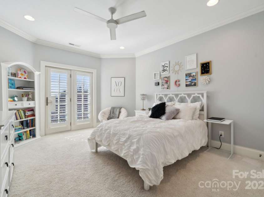 145 Milford Circle, Mooresville, NC 28117.  MLS# CAR4224444, YatesRealty ID 3459. Upper level suite 1 features Juliet balcony