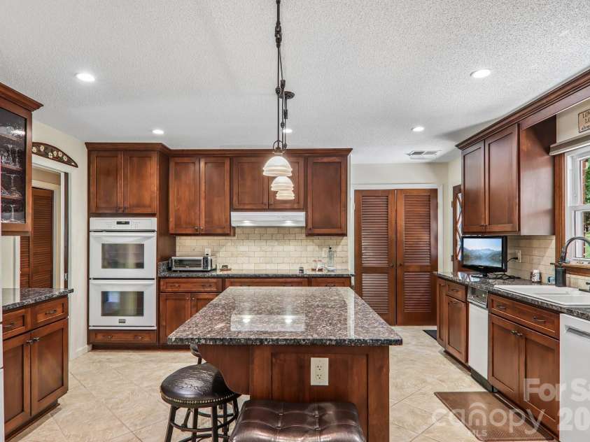 57 Chateau Place, Waynesville, NC 28786.  MLS# CAR4398098, YatesRealty ID 34591. 