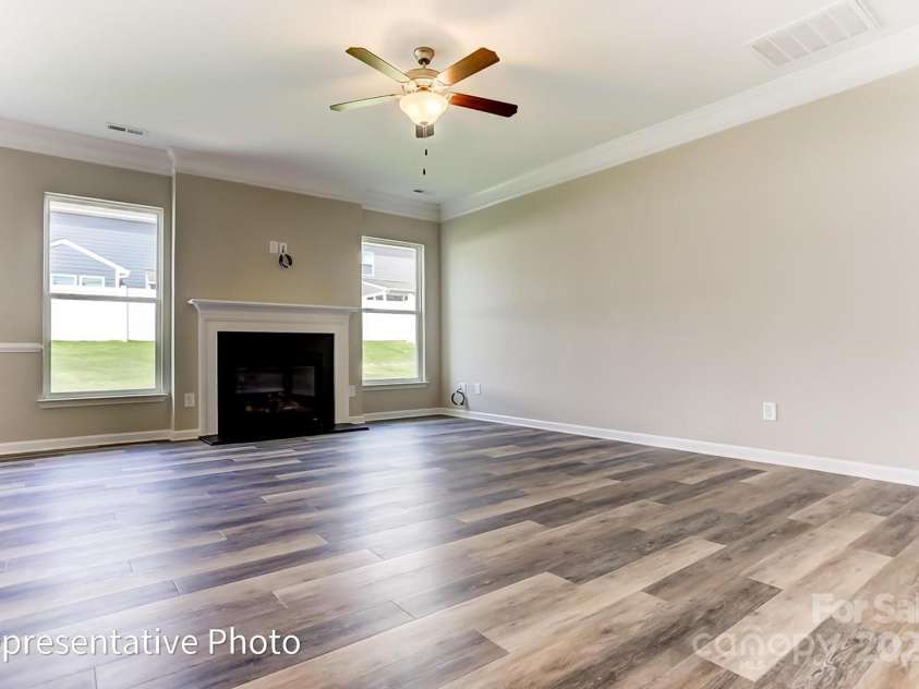 2042 Mantle Ridge Drive, Wesley Chapel, NC 28079.  MLS# CAR4296402, YatesRealty ID 34595. Chose traditional gas Fireplace, or has cosmo fireplace