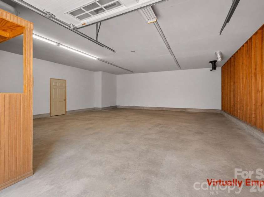 2269 Lee Roy Lane, Lenoir, NC 28645.  MLS# CAR4393336, YatesRealty ID 34595. Virtually Empty Garage 1