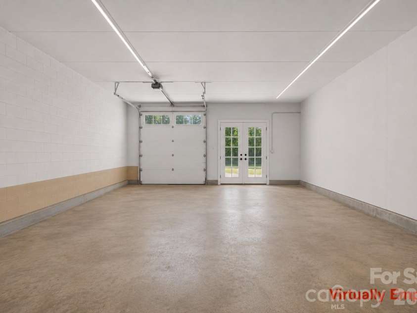 2269 Lee Roy Lane, Lenoir, NC 28645.  MLS# CAR4393336, YatesRealty ID 34595. Virtually Empty Garage 2