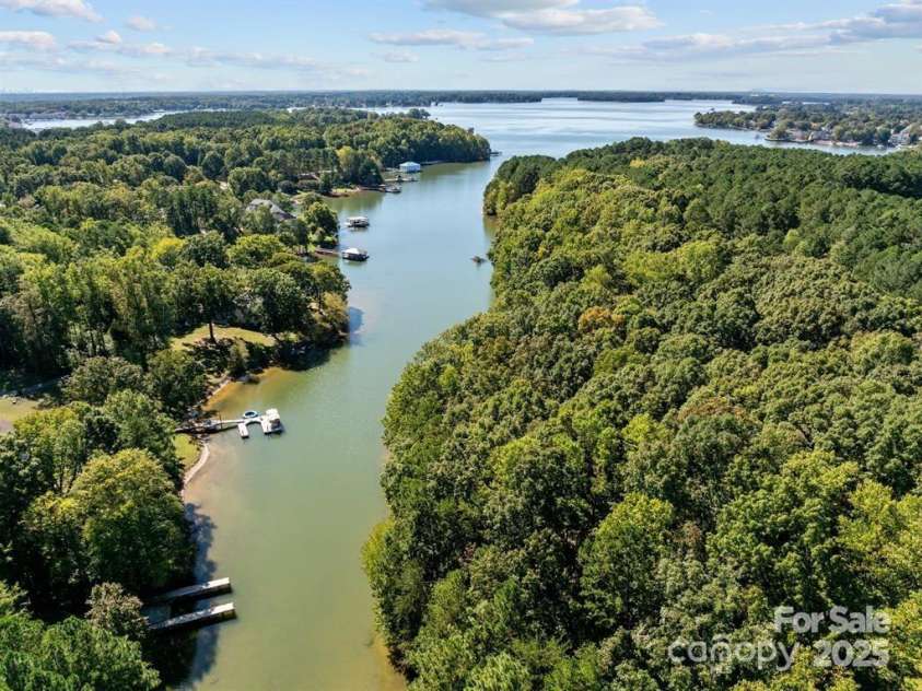 19241 Lake Norman Cove Drive, Cornelius, NC 28031.  MLS# CAR4283303, YatesRealty ID 34596. Day dock can be seen bottom left of pucture
