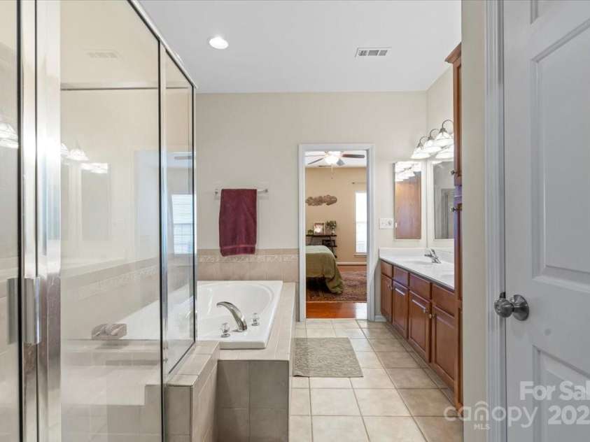19241 Lake Norman Cove Drive, Cornelius, NC 28031.  MLS# CAR4283303, YatesRealty ID 34596. Primary bath