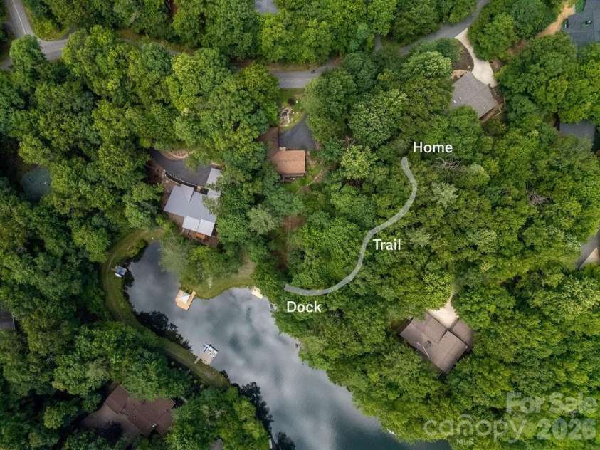 3125 Connestee Trail, Brevard, NC 28712.  MLS# CAR4396358, YatesRealty ID 34599. An aerial showing the lot and path