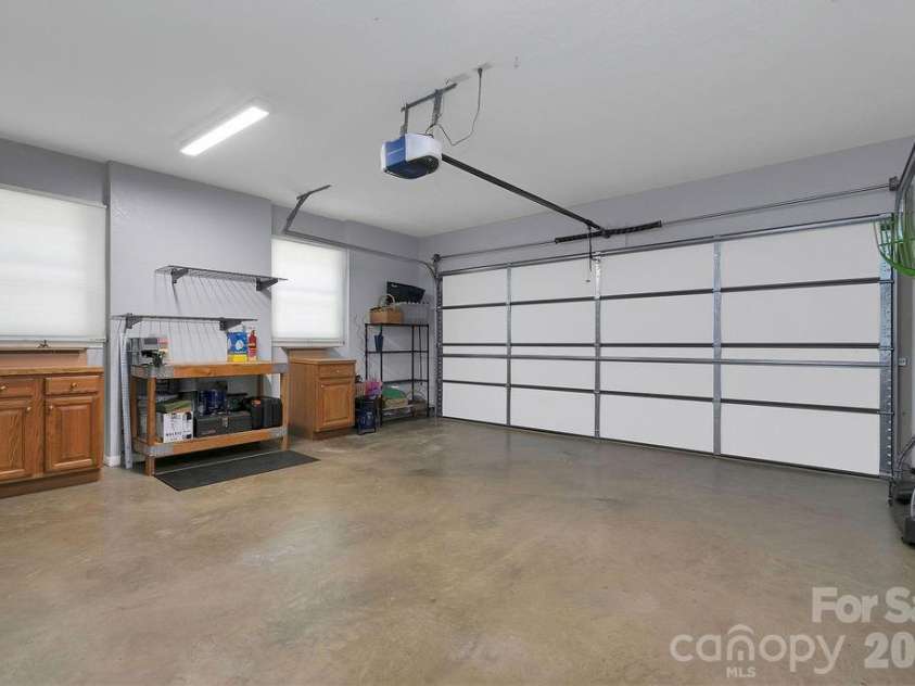 3125 Connestee Trail, Brevard, NC 28712.  MLS# CAR4396358, YatesRealty ID 34599. Over-sized, immaculate 2 car garage