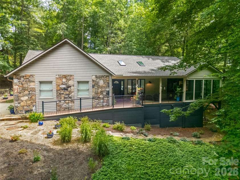 3125 Connestee Trail, Brevard, NC 28712.  MLS# CAR4396358, YatesRealty ID 34599. Single-level, lovely gardens & immaculate