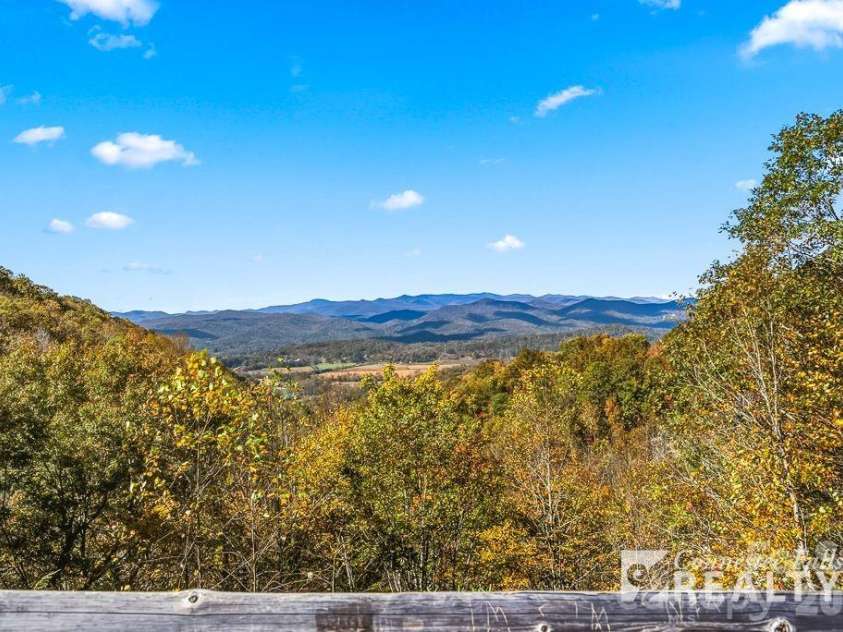 3125 Connestee Trail, Brevard, NC 28712.  MLS# CAR4396358, YatesRealty ID 34599. Views from the overlook above Connestee's main gate.