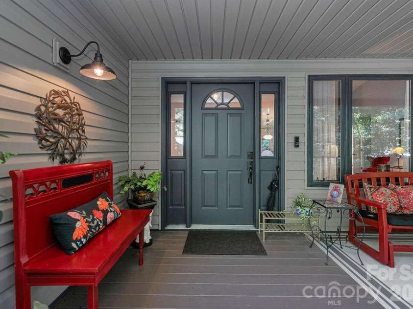 3125 Connestee Trail, Brevard, NC 28712.  MLS# CAR4396358, YatesRealty ID 34599. Welcoming front porch
