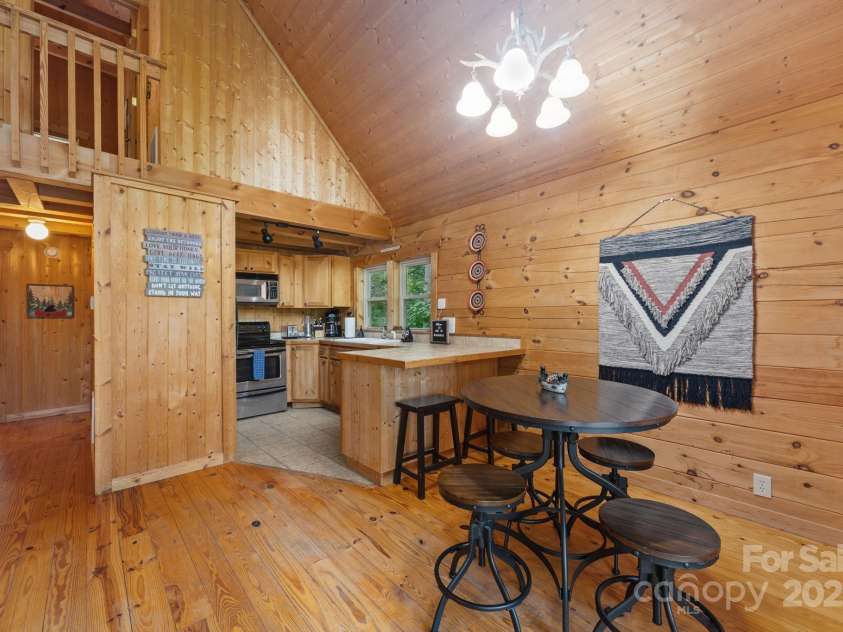 664 Sweetbriar Road, Lake Lure, NC 28746.  MLS# CAR4288832, YatesRealty ID 34604. Dining, Kitchen, Hall