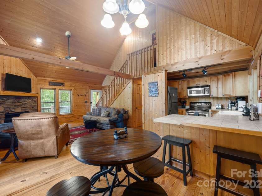 664 Sweetbriar Road, Lake Lure, NC 28746.  MLS# CAR4288832, YatesRealty ID 34604. Dining, Kitchen, Living Rooms