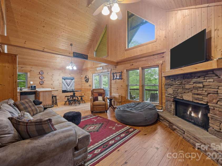 664 Sweetbriar Road, Lake Lure, NC 28746.  MLS# CAR4288832, YatesRealty ID 34604. Living Room view from front door