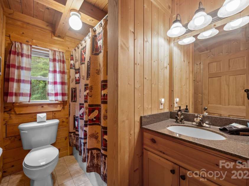 664 Sweetbriar Road, Lake Lure, NC 28746.  MLS# CAR4288832, YatesRealty ID 34604. Main Level Bathroom