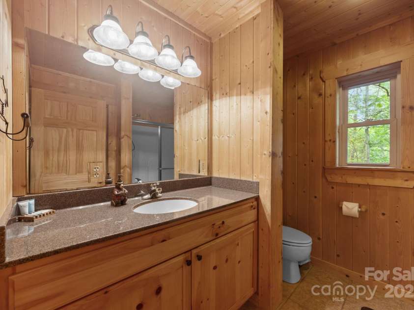 664 Sweetbriar Road, Lake Lure, NC 28746.  MLS# CAR4288832, YatesRealty ID 34604. Primary en suite