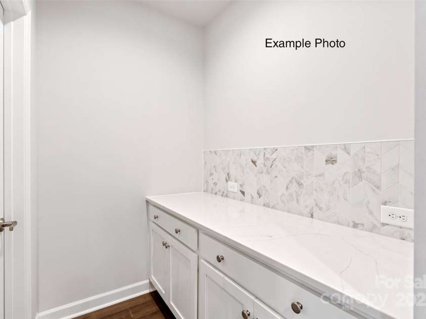 106 Cartington Way, Mooresville, NC 28115.  MLS# CAR4290232, YatesRealty ID 34612. Example Photo - Butler's Pantry
