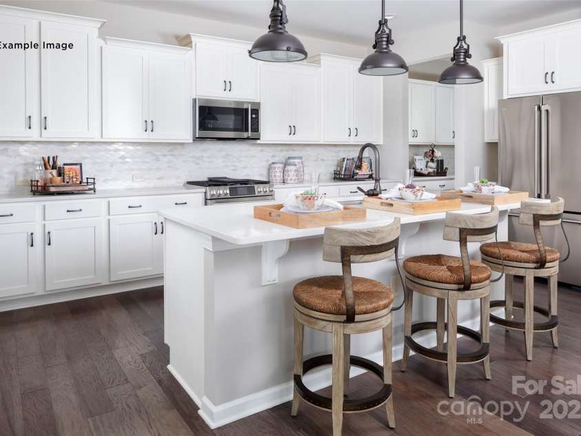 106 Cartington Way, Mooresville, NC 28115.  MLS# CAR4290232, YatesRealty ID 34612. Example Photo - Kitchen