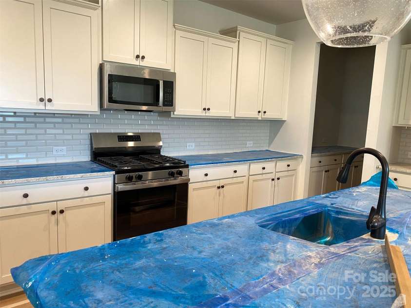 106 Cartington Way, Mooresville, NC 28115.  MLS# CAR4290232, YatesRealty ID 34612. Kitchen