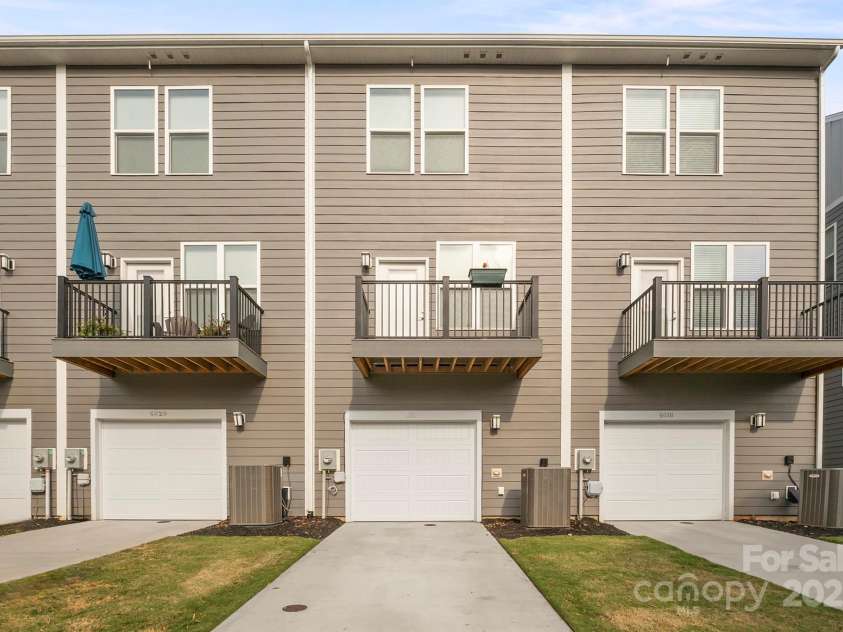 4018 Capital Ridge Court, Charlotte, NC 28205.  MLS# CAR4196575, YatesRealty ID 34613. 1-car garage and back balcony