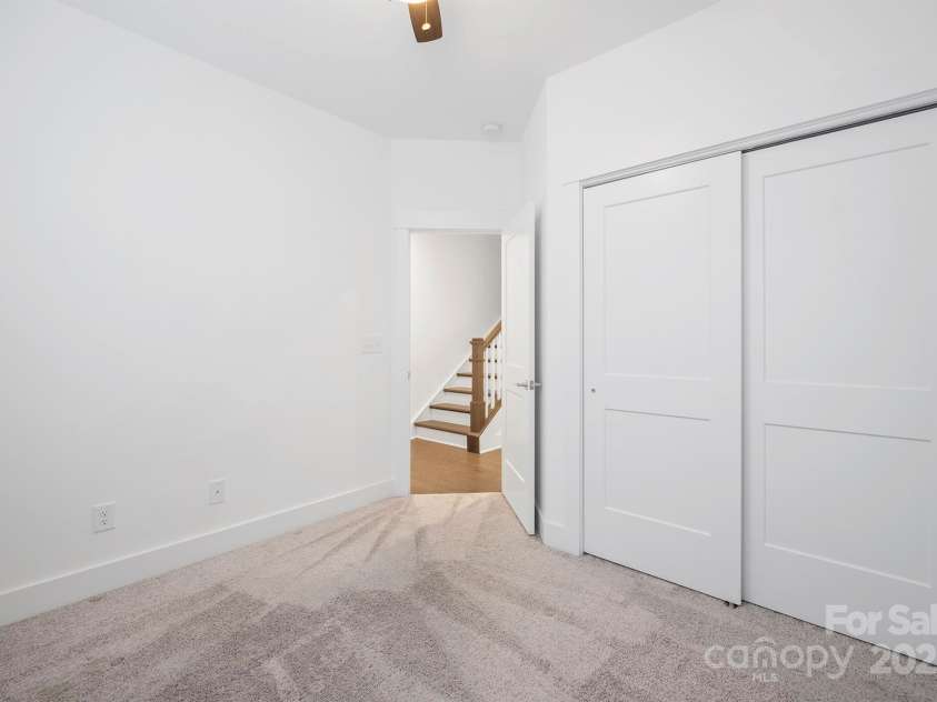4018 Capital Ridge Court, Charlotte, NC 28205.  MLS# CAR4196575, YatesRealty ID 34613. Bedroom #2 on Main level - perfect for office space