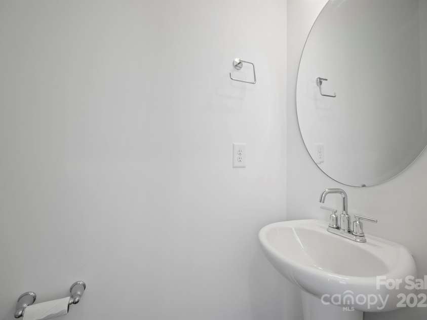 4018 Capital Ridge Court, Charlotte, NC 28205.  MLS# CAR4196575, YatesRealty ID 34613. Half bath