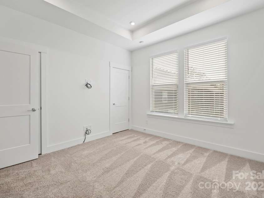 4018 Capital Ridge Court, Charlotte, NC 28205.  MLS# CAR4196575, YatesRealty ID 34613. Primary bedroom with en-suite bath