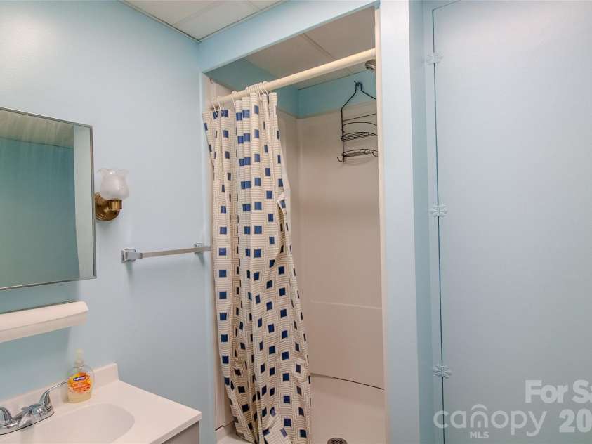 49 Jake Drive, Canton, NC 28716.  MLS# CAR4398234, YatesRealty ID 34618. Basement bathroom shower