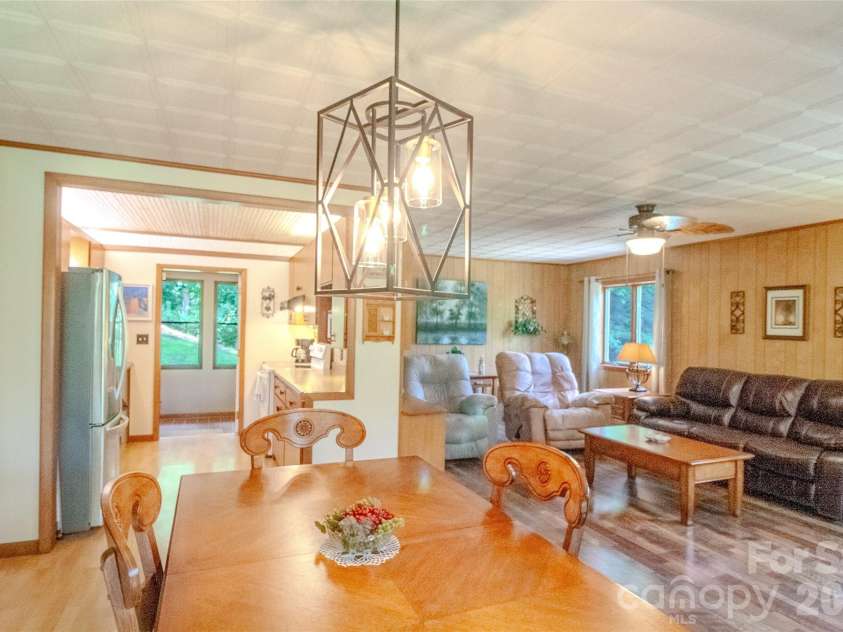 49 Jake Drive, Canton, NC 28716.  MLS# CAR4398234, YatesRealty ID 34618. Dining area, family room and kitchen