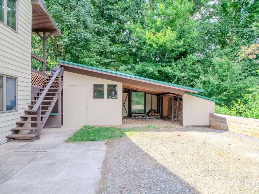 49 Jake Drive, Canton, NC 28716.  MLS# CAR4398234, YatesRealty ID 34618. Small workshop to the left and wood shed on the right.