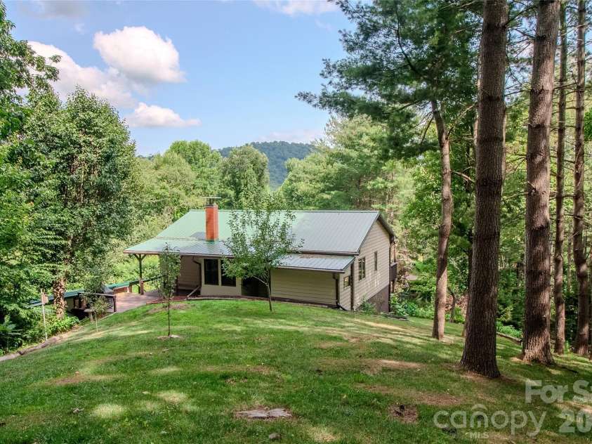 49 Jake Drive, Canton, NC 28716.  MLS# CAR4398234, YatesRealty ID 34618. View of the house from the back yard