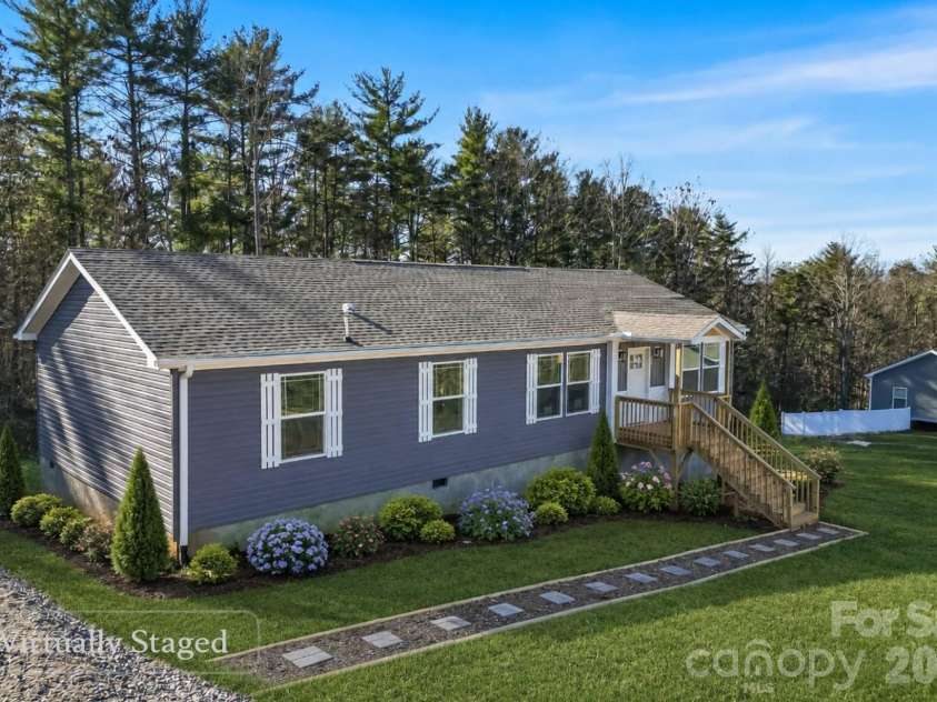 209 Walnut Branch Road, Weaverville, NC 28787.  MLS# CAR4272597, YatesRealty ID 3462. Virtually Staged to Show Landscaping Potential