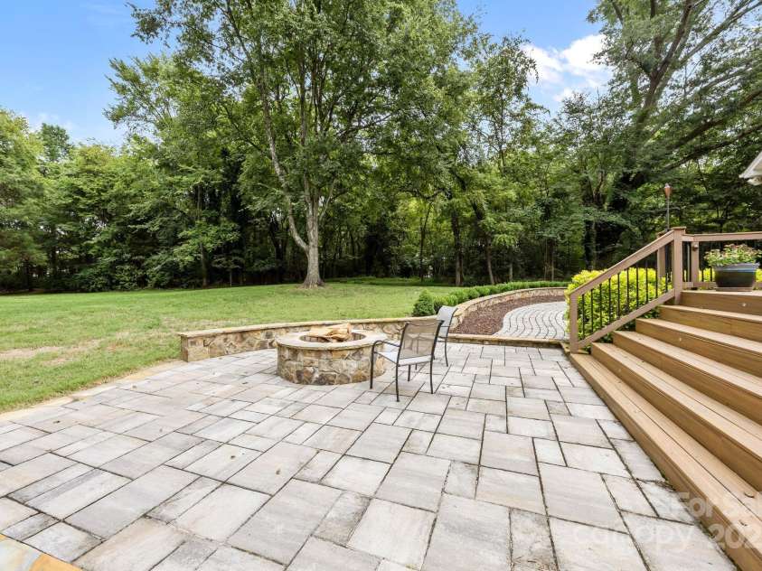 6802 Rock Island Road, Charlotte, NC 28278.  MLS# CAR4289658, YatesRealty ID 34622. Firepit
