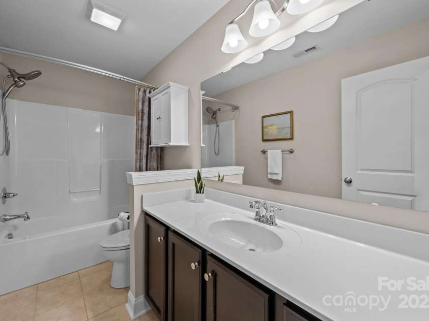 6802 Rock Island Road, Charlotte, NC 28278.  MLS# CAR4289658, YatesRealty ID 34622. Hall bathroom